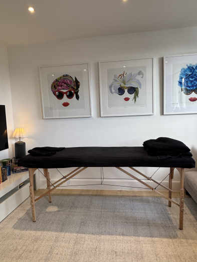 Mobile massage table setup in a London home